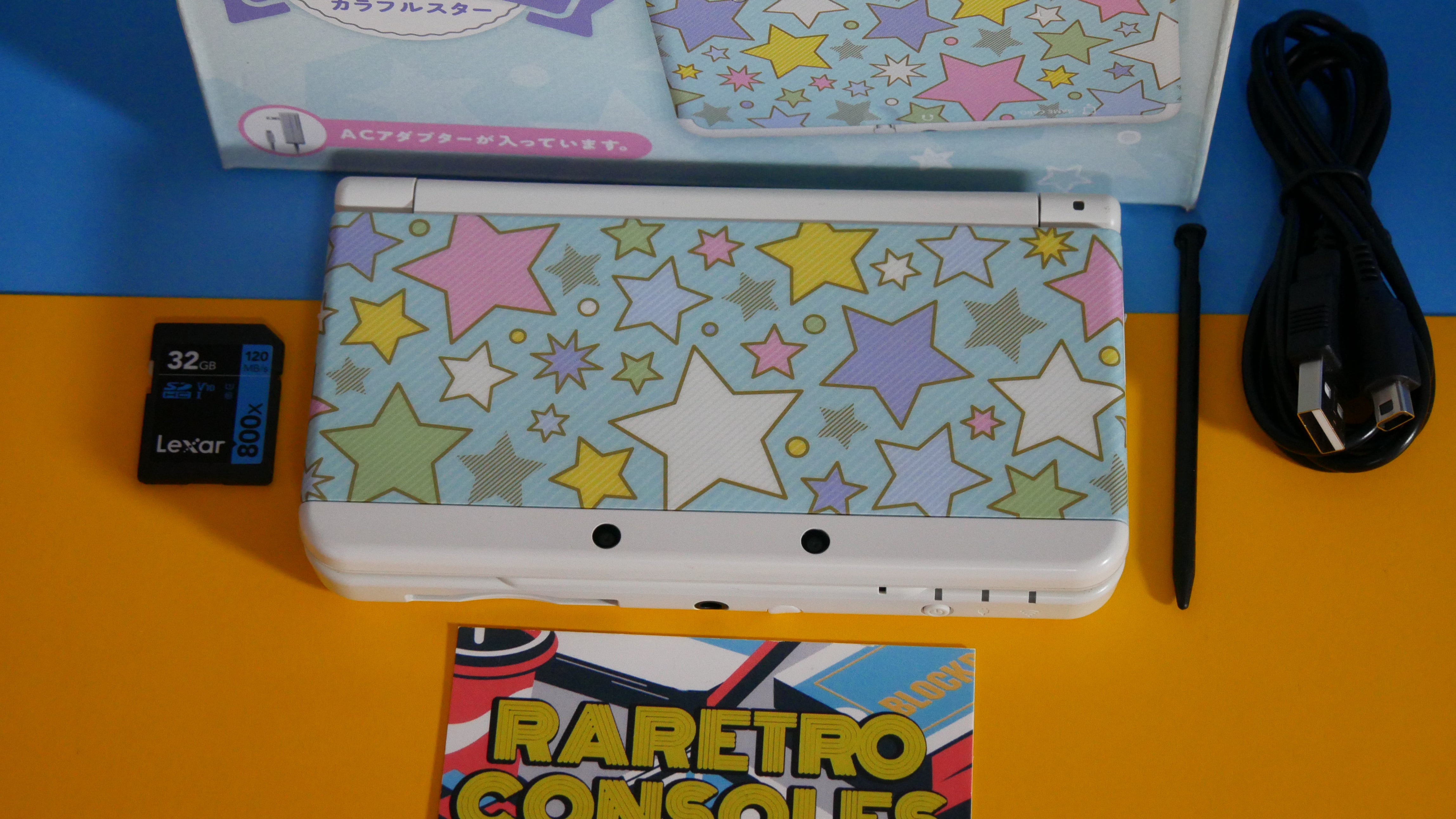 New Nintendo 3DS with Colorful Star Plates in Original Box 