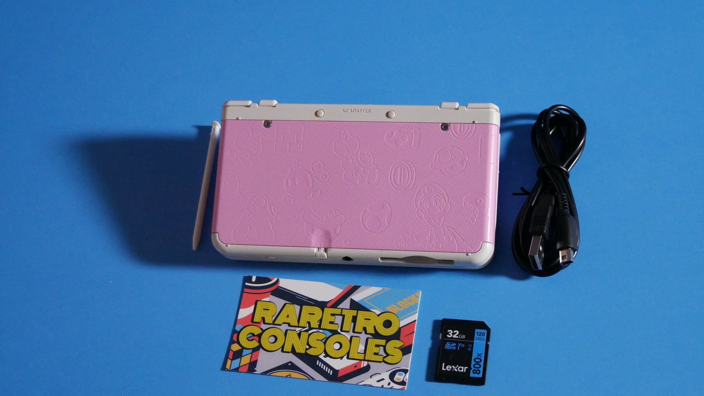 New Nintendo 3DS in White with No. 025 Pink Mario Embossed Plates