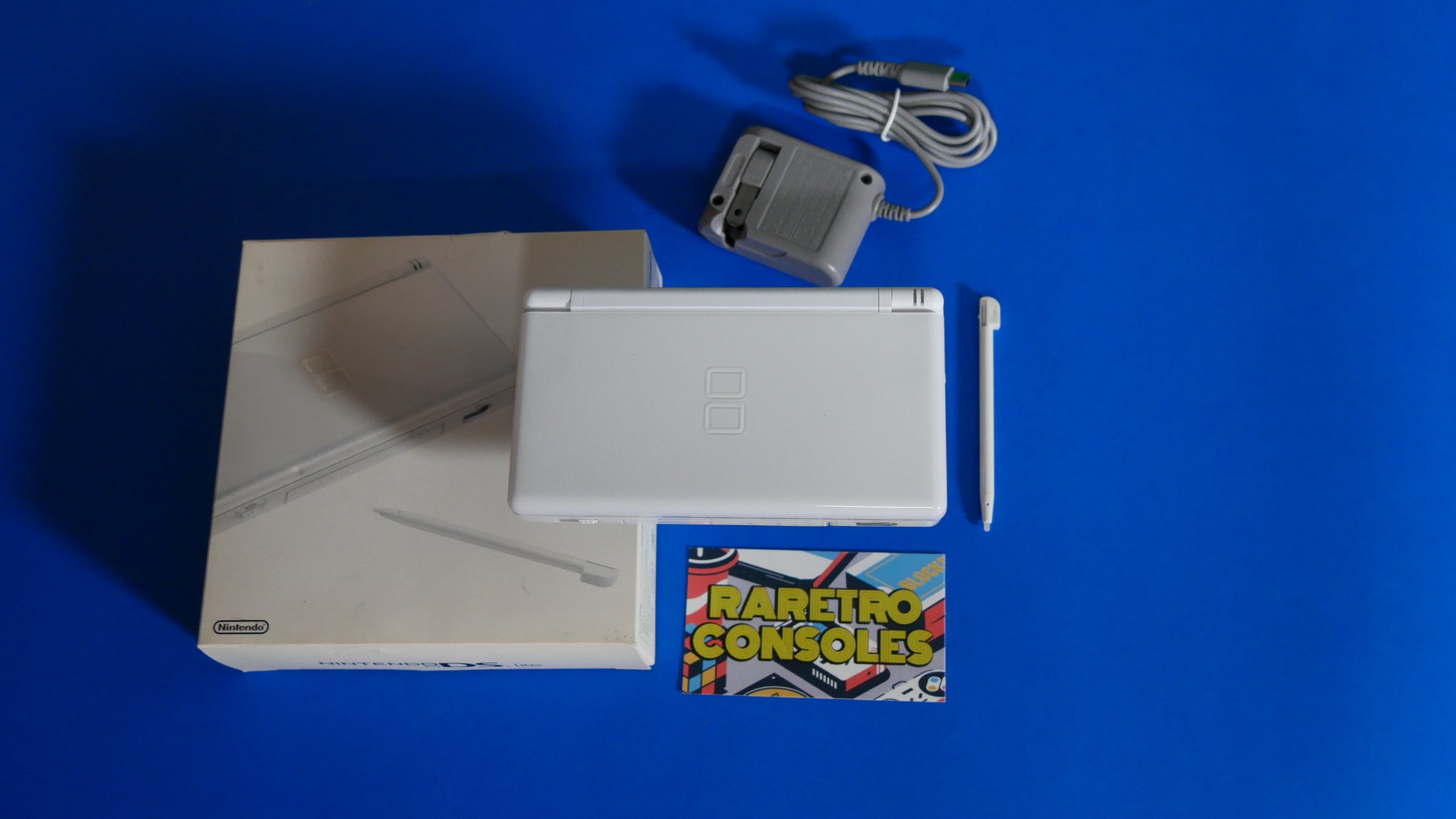 Nintendo DS Lite in Crystal White with Box | Raretro Consoles