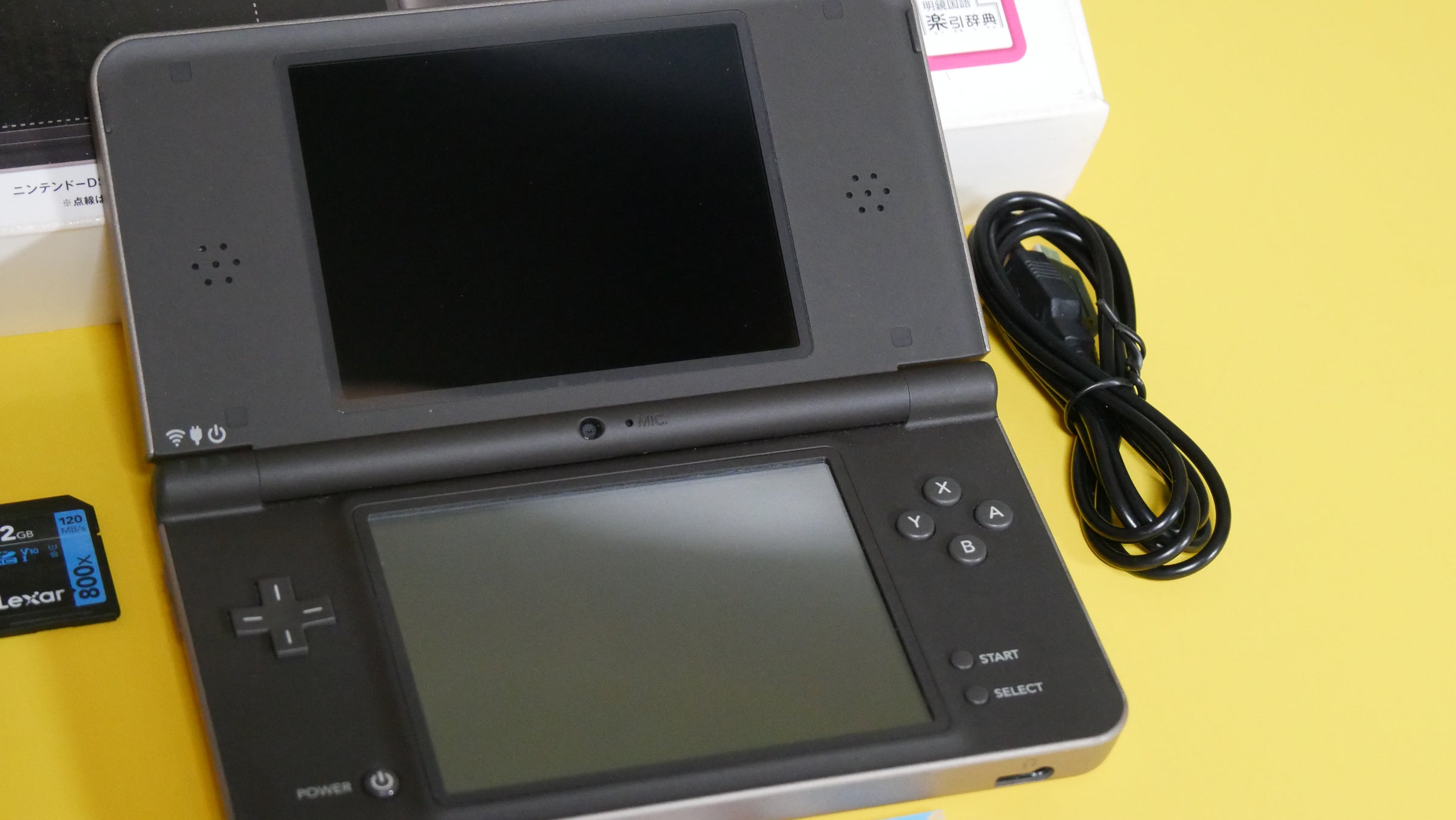 Nintendo DSi XL in Launch Day Bronze With Box | Raretro Consoles