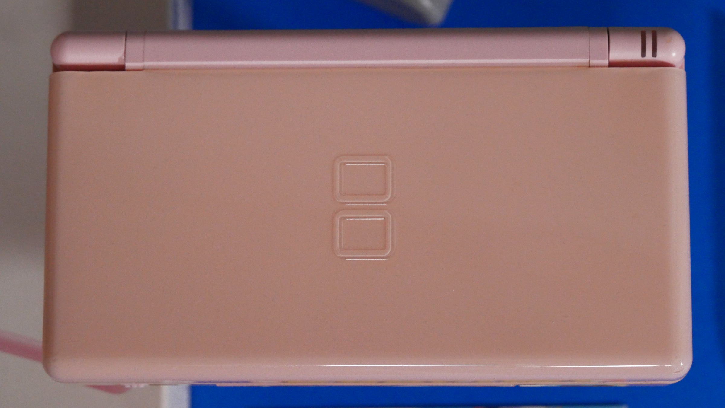 Nintendo DS Lite in Noble Pink with Box | Raretro Consoles