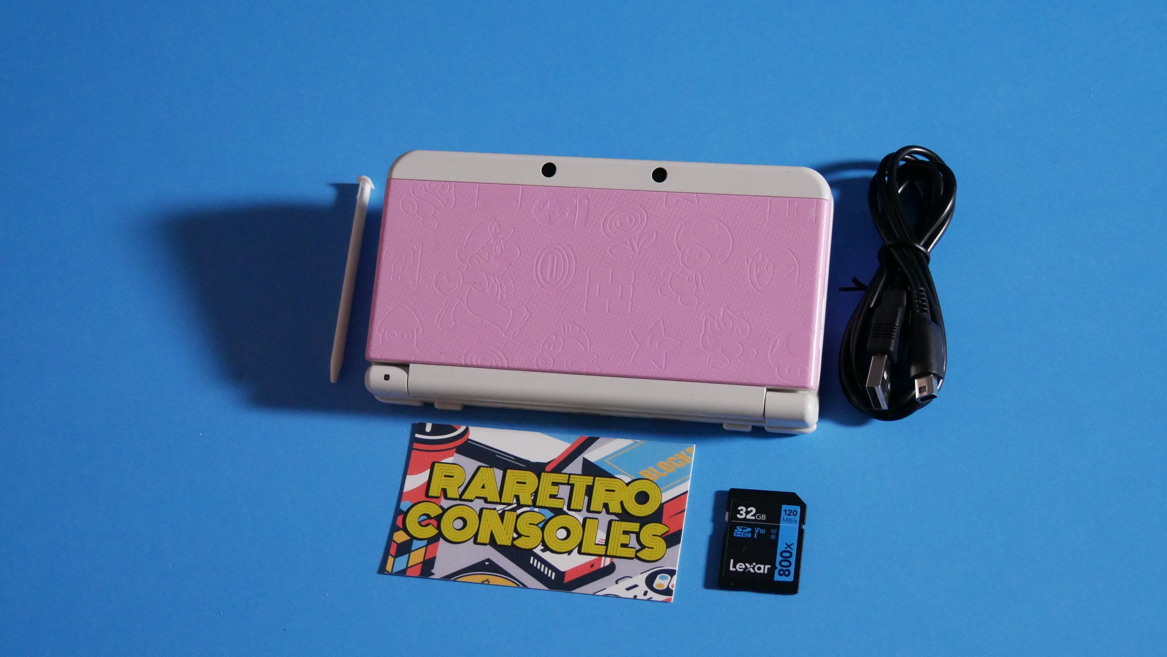 New Nintendo 3DS in White with No. 025 Pink Mario Embossed Plates